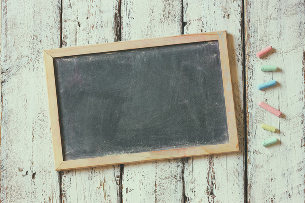 empty blackboard with chalks - Фото, зображення
