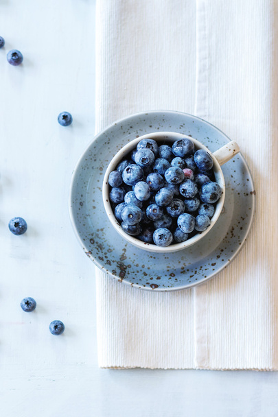Cup of blueberries - Foto, afbeelding