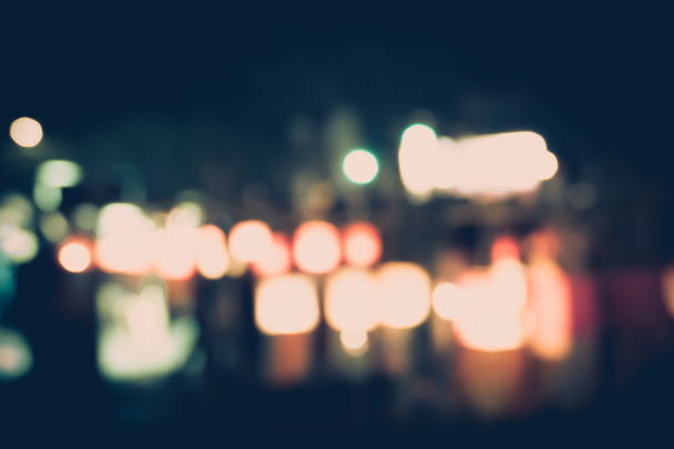 wazig licht in de stad in de nacht - Foto, afbeelding