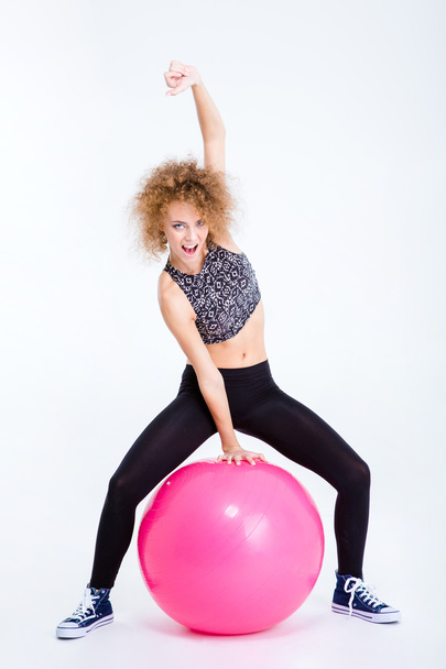 Funny woman workout with fitness ball - 写真・画像