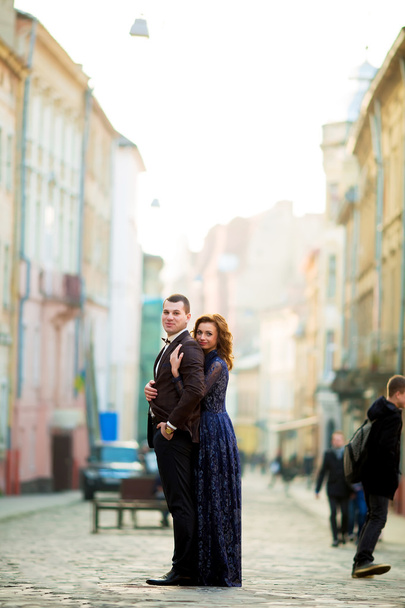 stylish luxury  haired bride and elegant groom, hugging with ten - Fotografie, Obrázek