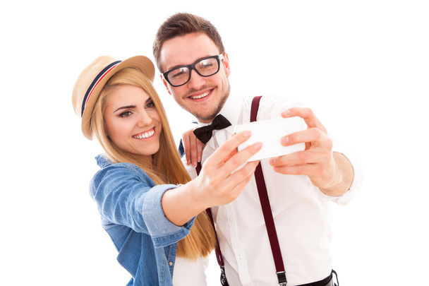 Young hipster couple making a selfie - Foto, imagen