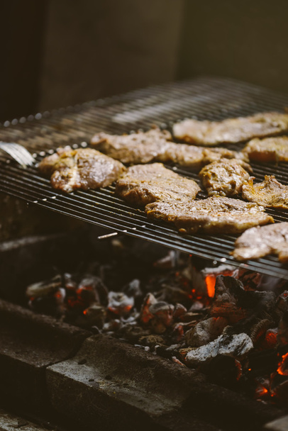 Pork meat chops on barbecue - Foto, afbeelding