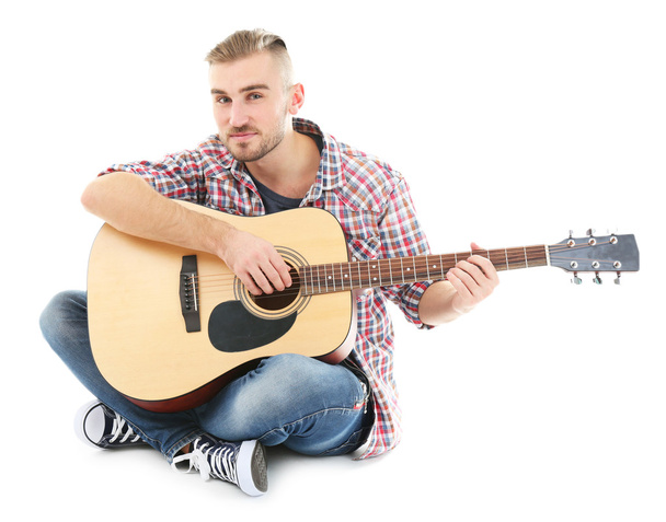 Young musician with guitar - Foto, Imagen