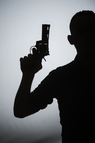 Stín muže s pistolí - Fotografie, Obrázek