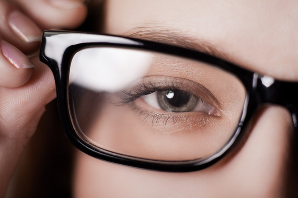 Eye shot through glasses - Foto, Imagem