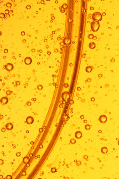 Soap bubbles orange liquid - Photo, Image