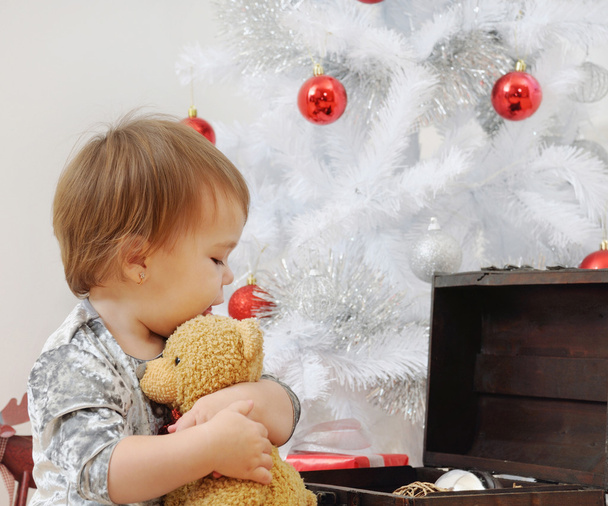 portrait of cute little baby girl playing with Christmas toys - Photo, Image