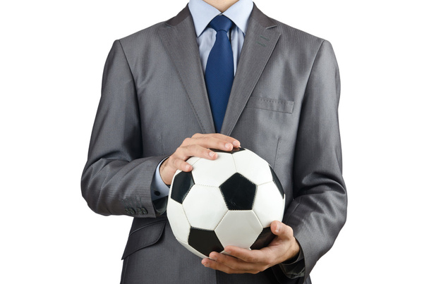 Businessman holding football on white - Zdjęcie, obraz