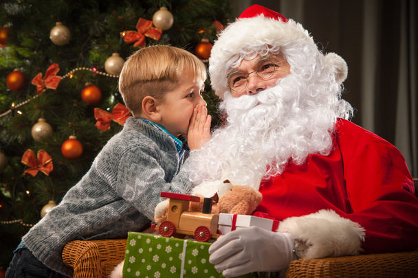 Santa Claus and a little boy - 写真・画像