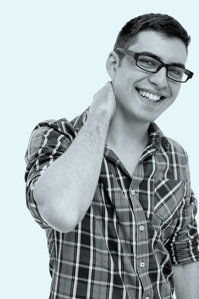 Laughing guy with hand on neck - Foto, imagen