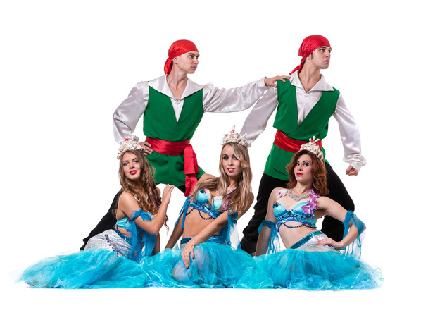 Carnival dancer team dressed as mermaids and pirates.  Isolated on white background in full length. - Foto, afbeelding