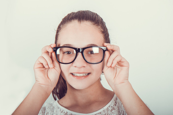 Sorpresa adolescente con gafas
 - Foto, imagen
