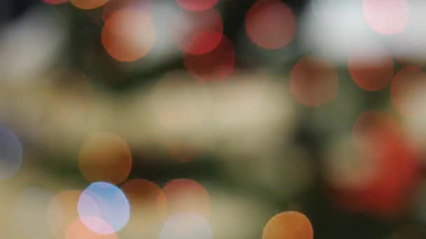 bunte Bokeh der Weihnachtsbeleuchtung Baum. Pfanne - Filmmaterial, Video
