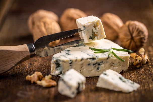 Blue cheese on vintage wooden background - Fotografie, Obrázek