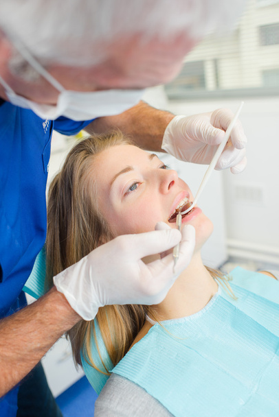 Having her scheduled dental check up - Фото, изображение
