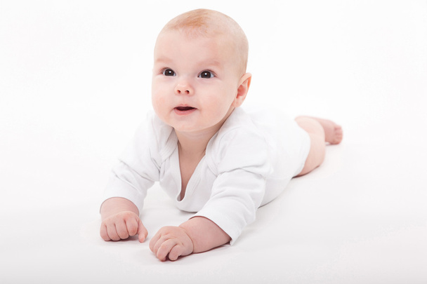 baby meisje op een witte achtergrond - Foto, afbeelding
