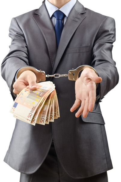 Handcuffed man with euro banknotes - Фото, изображение
