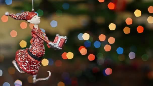 Christmas gnome toy shakes at bokeh. Title area - Footage, Video