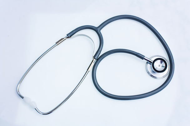 gray stethoscope on white background - Foto, imagen