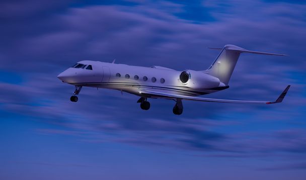 Side view of a private jet flying - Photo, Image