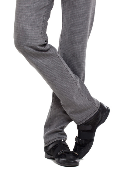 Close up of a man's legs wearing jeans - Foto, imagen