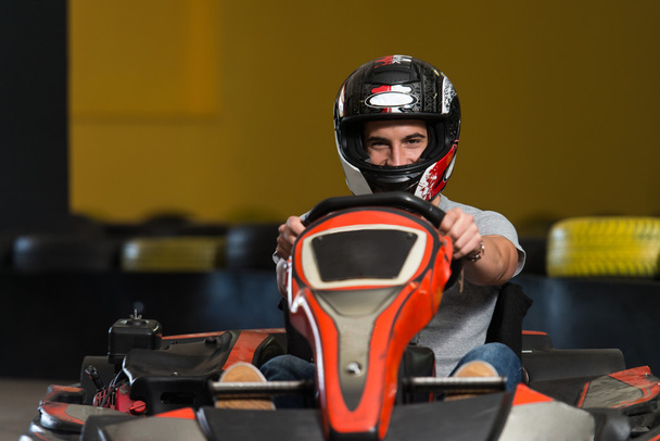 Man Is Driving Go-Kart With Speed In Karting - 写真・画像