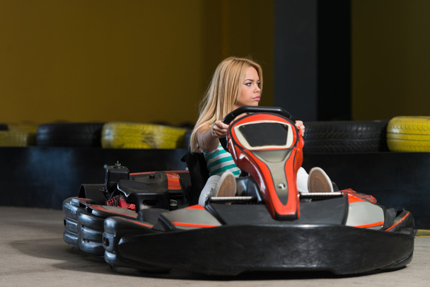 Young Woman Driving Go-Kart Karting Race - Foto, afbeelding