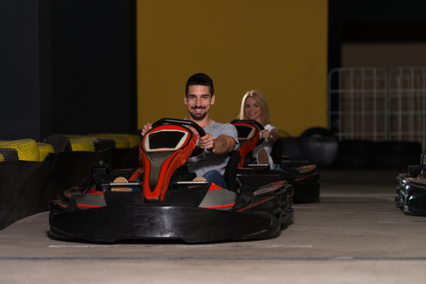 Group Of People Driving Go-Kart Karting Race - Foto, immagini
