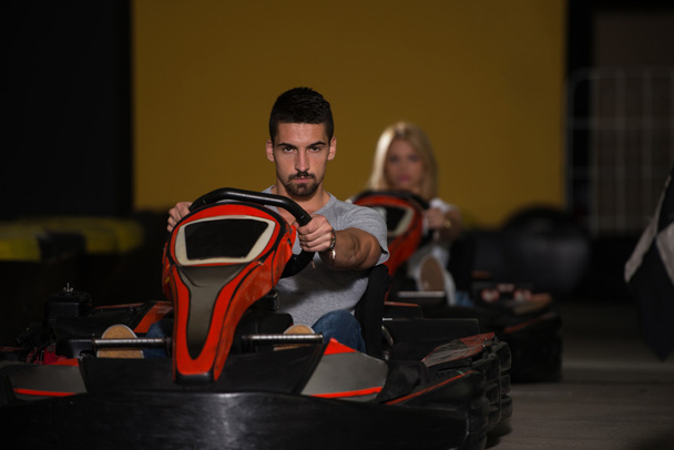 Group Of People Driving Go-Kart Karting Race - Foto, afbeelding