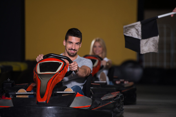 Portrait Of A Race Karting Couple - Foto, afbeelding