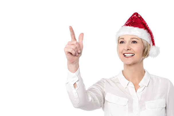 Young lady in santa cap - Photo, Image