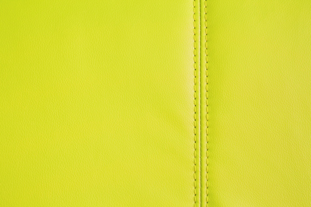 Фоновая текстура жёлтой искусственной кожи
 - Фото, изображение
