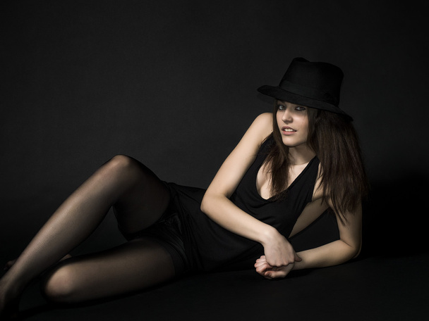 Beautiful and funny girl portrait wearing hat and posing - Fotó, kép