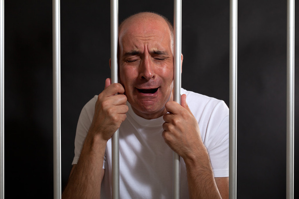 Desperate man in jail - Фото, зображення