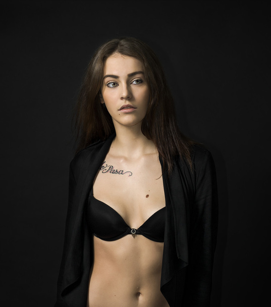 Beautiful girl portrait wearing black lingerie and cardigan - Photo, image