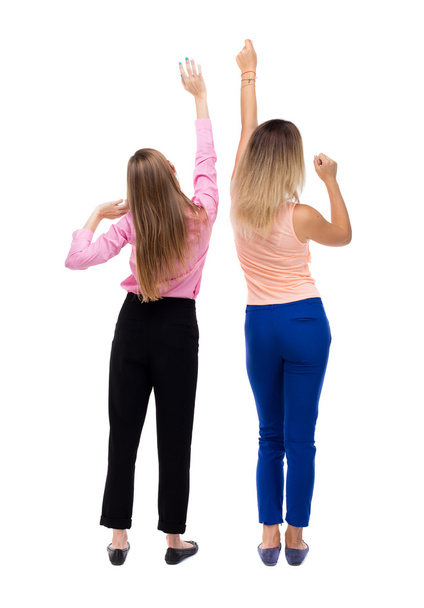 Two young  women dancing. - Фото, изображение