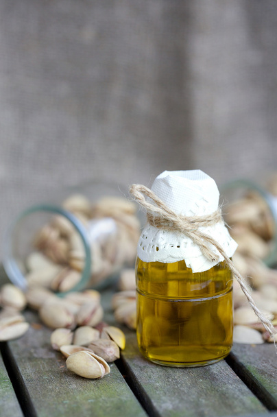 Pistachio nuts in a glass bottle - Photo, Image