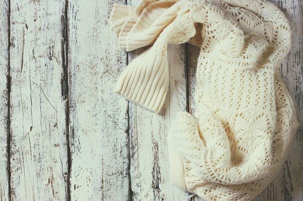 cozy knitted sweater on table - 写真・画像