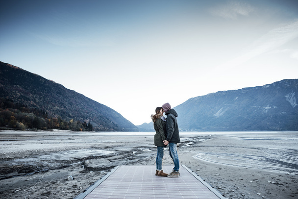 Romantic young couple on a pier - Fotografie, Obrázek