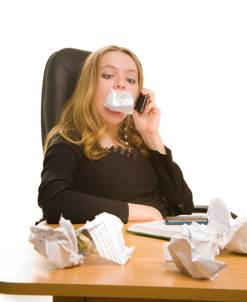 Businesswoman with sheet of paper in her mouth - Foto, immagini