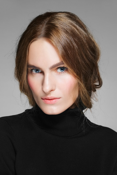 Portrait of pretty girl in black pullover - Fotografie, Obrázek