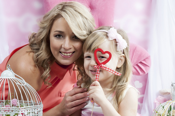 mother and daughter with decorative heart - Photo, Image