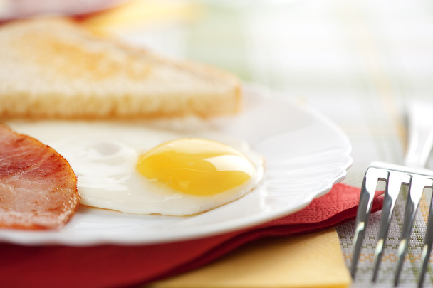 Fried eggs with bacon and toasts - Photo, Image