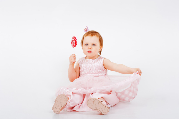 Little Girl with Candy cane - Foto, afbeelding