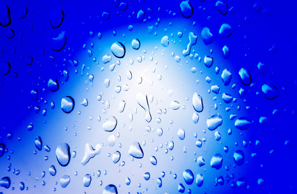 Μπλε φόντο με σταγόνα νερό - Φωτογραφία, εικόνα