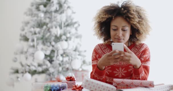 woman checking for Xmas messages - Footage, Video