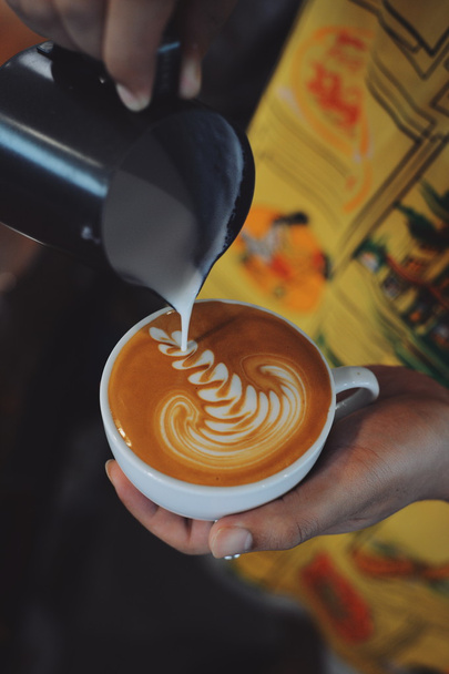 cup of coffee latte on the wood texture  - Valokuva, kuva