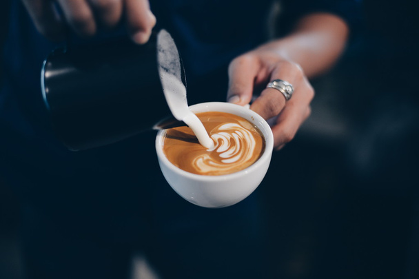 cup of coffee latte on the wood texture  - Valokuva, kuva
