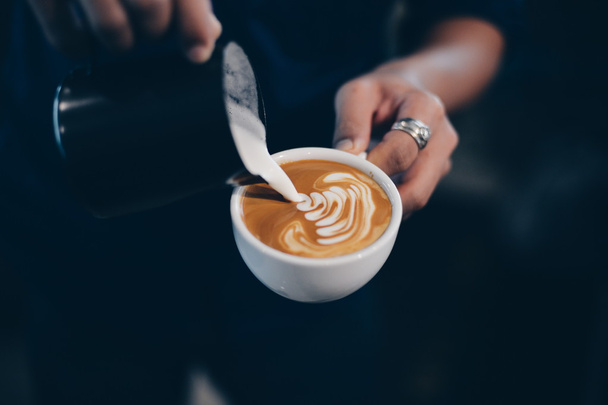 cup of coffee latte on the wood texture  - Фото, зображення